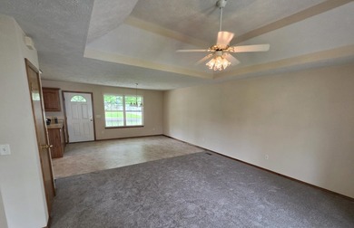 1,255 Square foot home with an open floor plan has a vaulted - photo 12