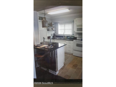 Beautifully updated and thoughtfully designed, this turnkey - photo 10