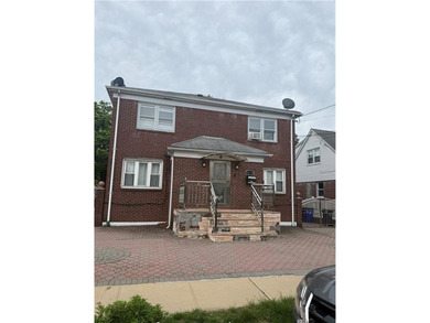 Two-family brick home situated on a 5,000 sq ft lot in Rosedale - photo 2