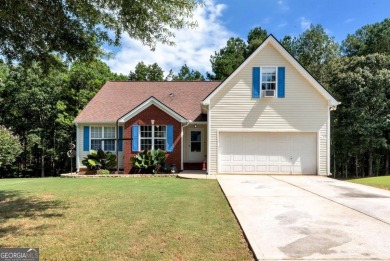 Lake Home For Sale in Flowery Branch, Georgia