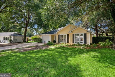 Welcome home to this charming 3-bedroom, 2-bath cottage-style - photo 1