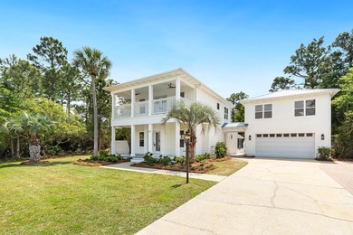 Welcome to 74 Pelican Bay Drive, a beautifully remodeled coastal - photo 3