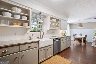 Welcome home to this charming 3-bedroom, 2-bath cottage-style - photo 10