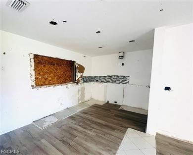 Property requires a full renovation. Damage includes missing - photo 11