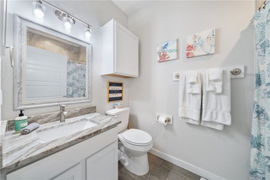 This fully furnished two-bedroom, one bath townhome is in one of - photo 17
