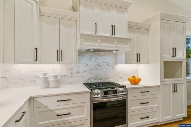 Single story living at its finest! Separate primary suite