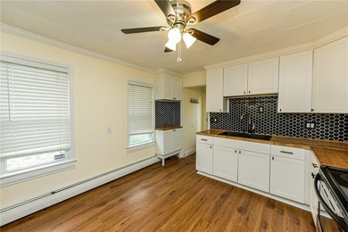 Welcome to 441 Benton Street! This Cape Cod style home located - photo 5