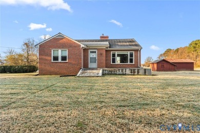 Cozy well-built Brick Rancher on tucked away 1.06 Acres in the