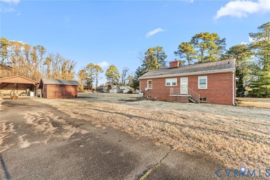 Cozy well-built Brick Rancher on tucked away 1.06 Acres in the