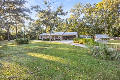Welcome to this charming 3-bedroom, 2-bath home with a - photo 1