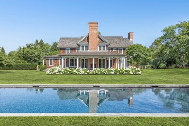Down a long gated driveway on a secluded and beautifully - photo 46