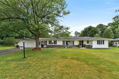Welcome to 33 Greenbriar Dr in Gates. This Massive ranch is just - photo 1