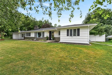 Welcome to 33 Greenbriar Dr in Gates. This Massive ranch is just - photo 2