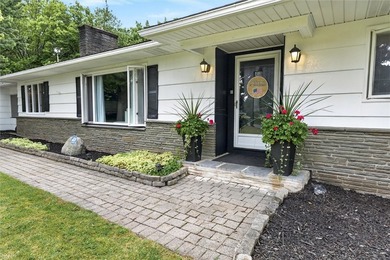 Welcome to 33 Greenbriar Dr in Gates. This Massive ranch is just - photo 3