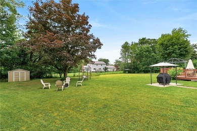 Welcome to 33 Greenbriar Dr in Gates. This Massive ranch is just - photo 5
