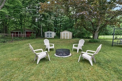 Welcome to 33 Greenbriar Dr in Gates. This Massive ranch is just - photo 6