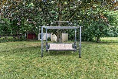 Welcome to 33 Greenbriar Dr in Gates. This Massive ranch is just - photo 7