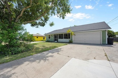Welcome to this beautifully updated 3-bedroom, 2-bath, 2-car - photo 2