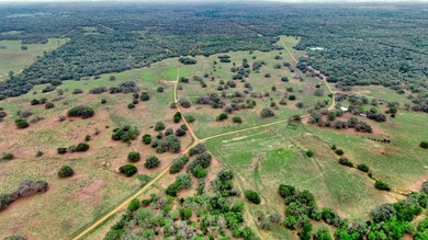 Rare opportunity to own open pasture & wooded ranchland w/ - photo 2