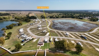 Waterfront lake lot on beautiful Peninsula Point - photo 4