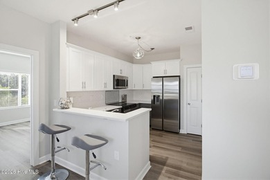Welcome to coastal living at its finest in this inviting condo - photo 11
