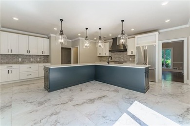Welcome to your dream home overlooking the lake & pristine - photo 12