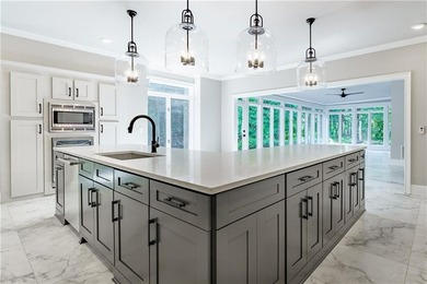 Welcome to your dream home overlooking the lake & pristine - photo 14