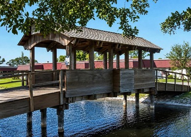 Welcome to this desirable 55+ community End-unit villa in the - photo 17