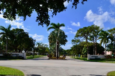 Welcome to this desirable 55+ community End-unit villa in the - photo 21