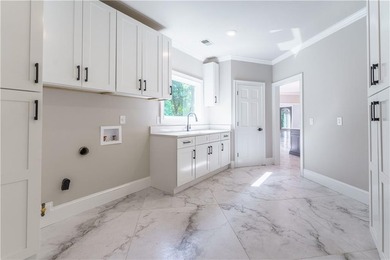 Welcome to your dream home overlooking the lake & pristine - photo 29