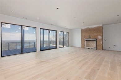 Perched high above Lake Toxaway, this exquisite new-construction - photo 8