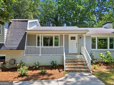 Welcome home to this beautifully renovated 3-bedroom, 2-bathroom - photo 4