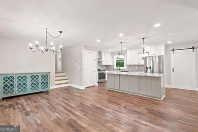 Welcome home to this beautifully renovated 3-bedroom, 2-bathroom - photo 6