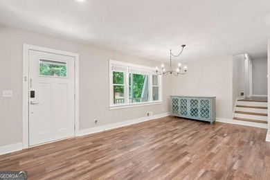Welcome home to this beautifully renovated 3-bedroom, 2-bathroom - photo 7