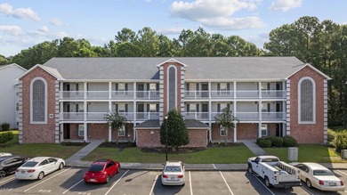 This beautifully updated, ground-floor 3-bedroom, 2-bath condo - photo 1