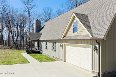 Beautiful custom lake home on 2+ acre waterfront lot with dock - photo 6