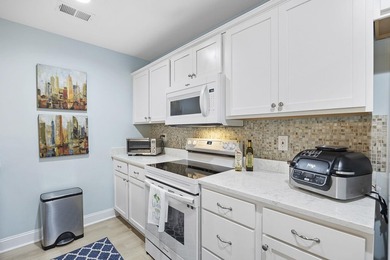 This beautifully updated, ground-floor 3-bedroom, 2-bath condo - photo 9