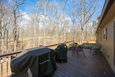 Beautiful custom lake home on 2+ acre waterfront lot with dock - photo 9