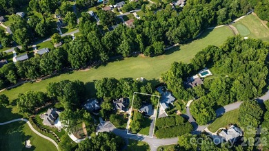 Perfectly situated on the 13th fairway of the prestigious Cramer - photo 2