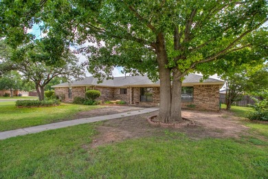 This spacious 3-bedroom, 2.5-bath home is situated on a - photo 2