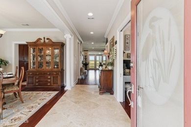 Your coastal oasis awaits! Exceptionally maintained custom-built - photo 8