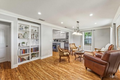 Nestled on an owned lot along the shores of Lake Nasworthy, this - photo 3