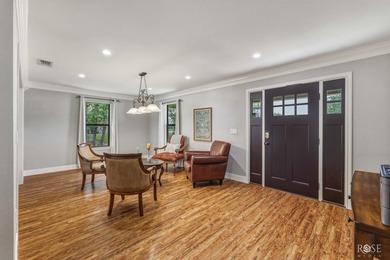 Nestled on an owned lot along the shores of Lake Nasworthy, this - photo 4