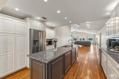 Nestled on an owned lot along the shores of Lake Nasworthy, this - photo 6