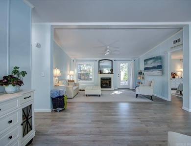 Welcome to this beautifully updated, fully furnished 3 bed 2