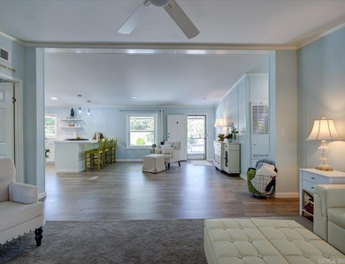 Welcome to this beautifully updated, fully furnished 3 bed 2