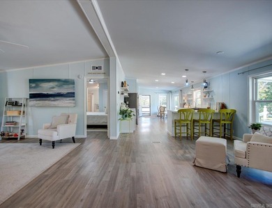 Welcome to this beautifully updated, fully furnished 3 bed 2