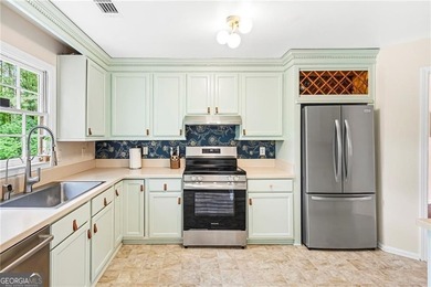 Step into this beautifully refreshed split-level home, ready and - photo 15