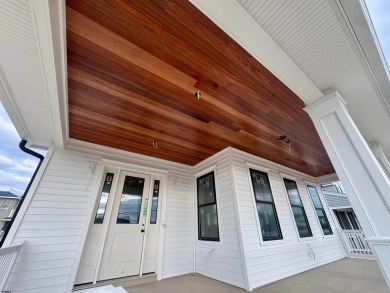 Home Sweet Home! Nestle in at the shore in this gorgeous custom