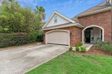 Set in a quiet Brunswick gated neighborhood, this four-bedroom - photo 3